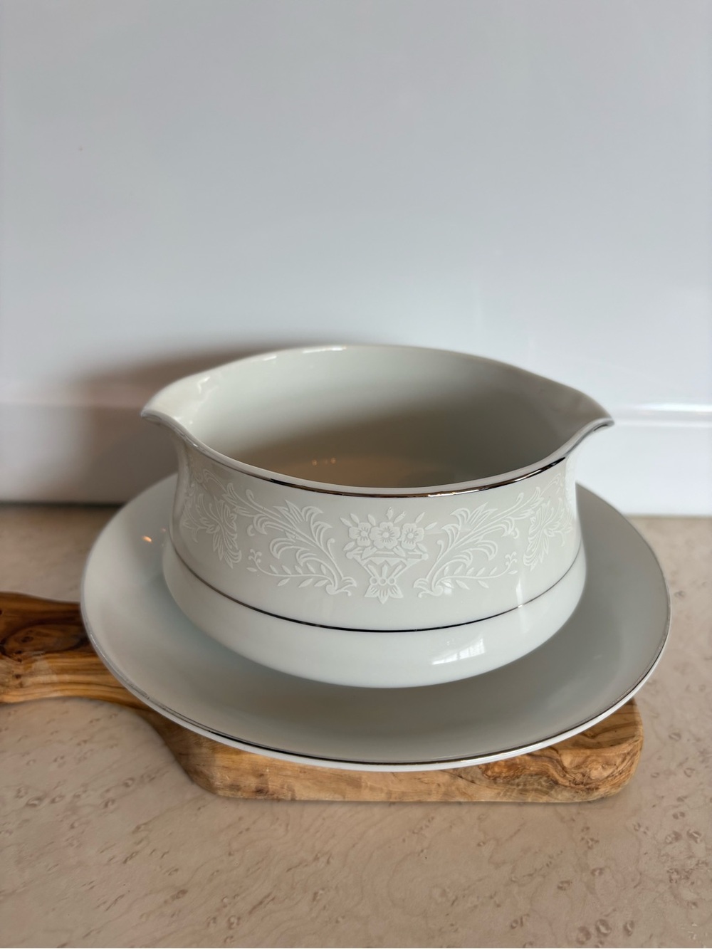 vintage fine china gravy boat with an underplate by the International Silver Co.